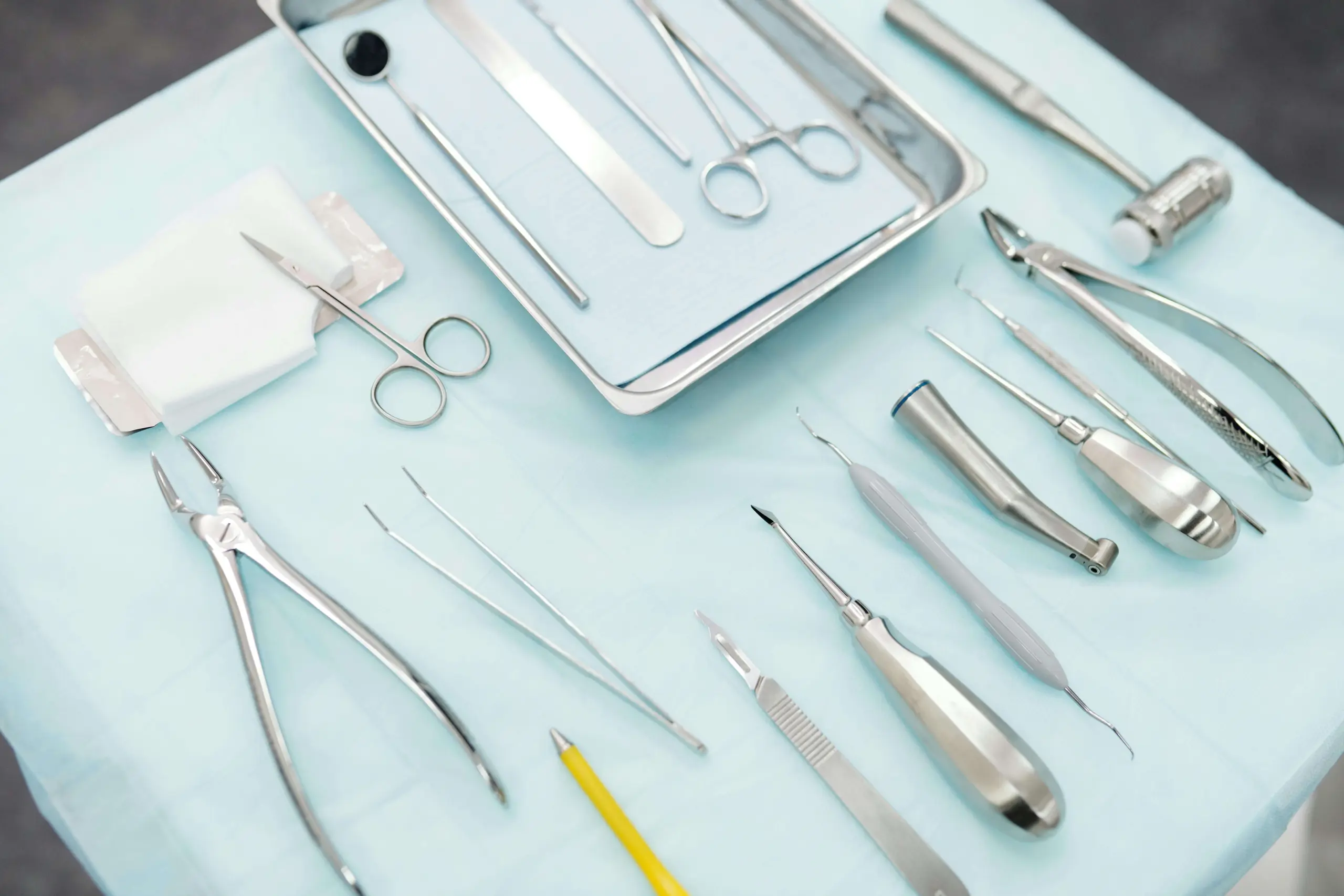 Dentist tools on a plate.