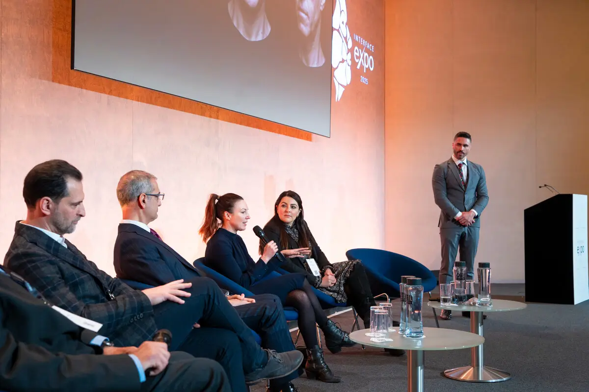 Dr James Olding and a panel of experts on the stage of Interface Expo 2025.